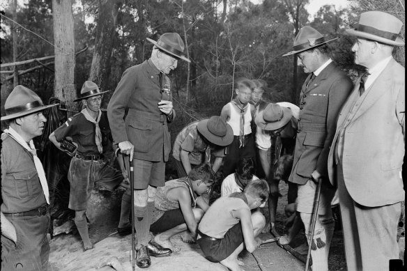Founder of the Boy Scouts movement Lord Baden Powell with a group of young scouts, New South Wales, 1931 