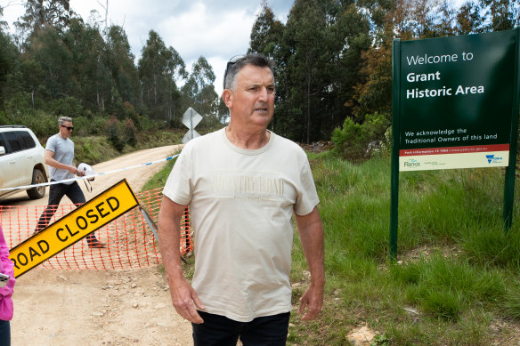 Assistant Commissioner Bob Hill heads into the search site.