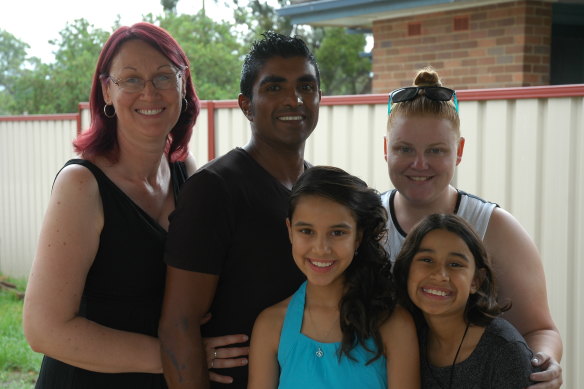 The Owens with their children (from left) K, Jazmin and Zyx in 2014.