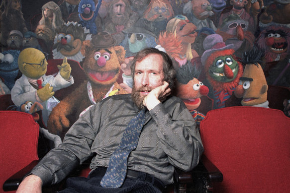 Jim Henson in 1985 surrounded by some of his <i>Sesame Street</i> creations.