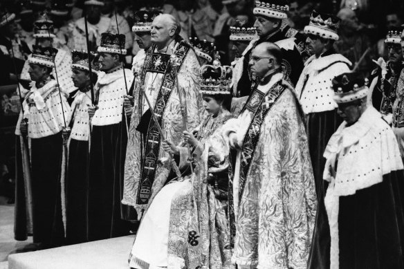 Queen Elizabeth II is crowned the monarch of Britain in 1953.