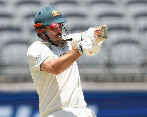 Mitchell Marsh is struck in the helmet, a fate he suffered twice during the Perth Test.