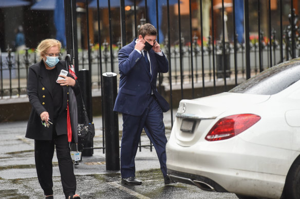 Tim Smith arrived at Parliament House for his press conference with his electorate officer, Caroline Inge. 