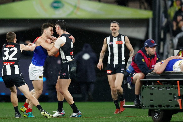 Flashback: Brayden Maynard and Jack Viney clash as Angus Brayshaw leaves the field on a stretcher.