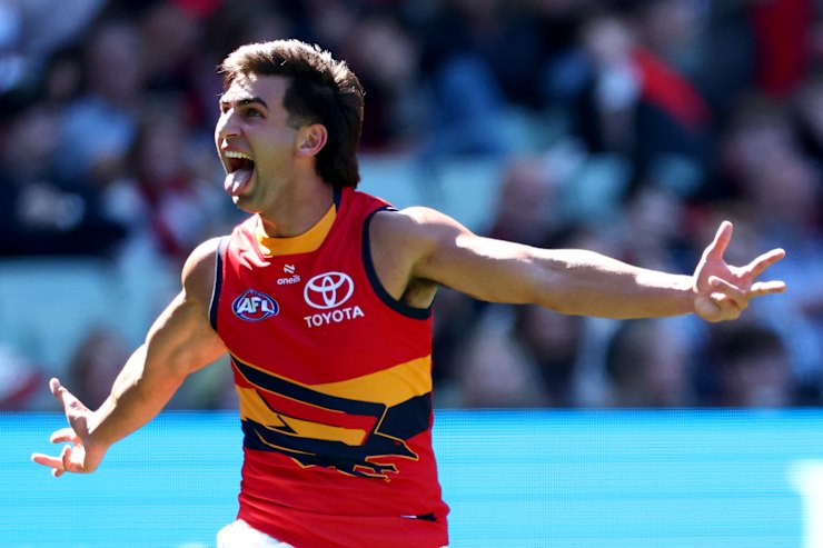 Adelaide Crows forwards celebrate a goal against Essendon
