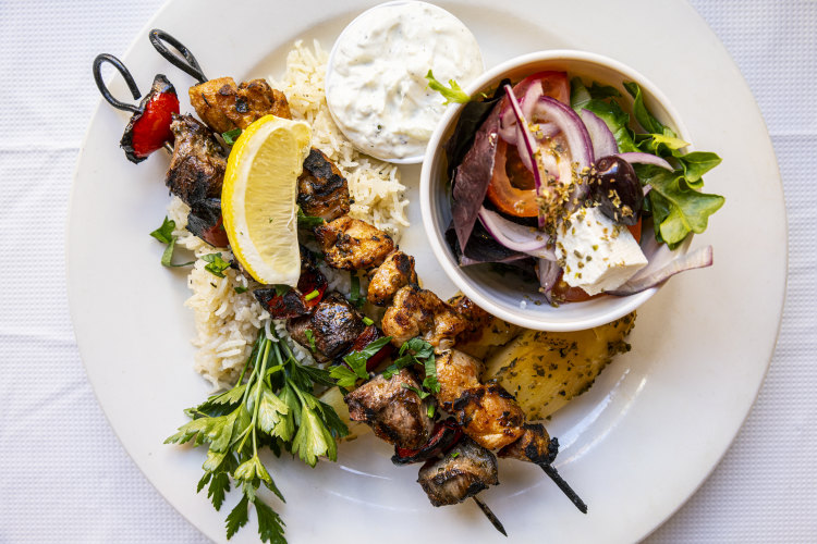 Kalamaki (mixed skewers served over rice) at Tsindos Greek restaurant in Melbourne CBD.