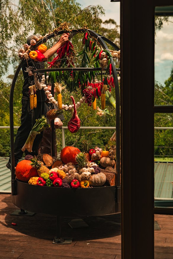 Produce is cooked on a fire dome at Fire Kitchen at Osborn House.