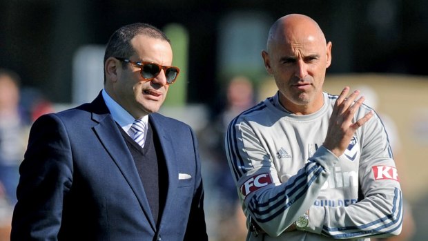New boss on the way: Melbourne Victory coach Kevin Muscat chats with chairman Anthony Di Pietro.