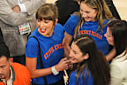 Taylor Swift shocked with an invite to the Knicks game after showing her public support for a rival. 