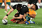 Leroy Carter of the All Blacks scores a try.