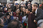 Prince Harry and Meghan drew large crowds when they made their public return to the spotlight in Nottingham on Thursday.