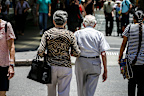 An elderly couple walks down the street in Brisbane.  generic, retirement, seniors , pension, old age, superannuation, nest egg on January 7, 2016 in Brisbane, Australia.  (Photo by )