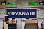 The man was pulled back inside the aircraft by fellow passengers after a window became dislodged.