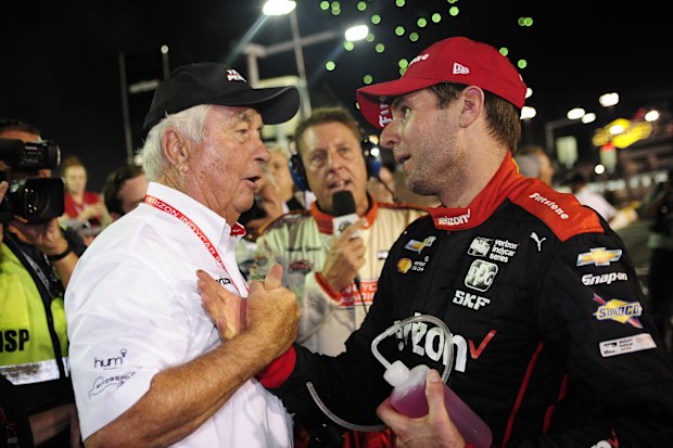 Team owner Roger Penske congratulated Will Power after he won the IndyCar Series in 2018.