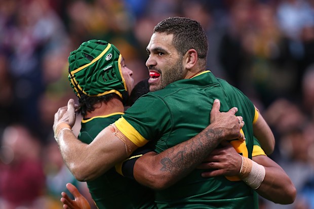 Johnathan Thurston, Greg Inglis and Valentine Holmes of Australia celebrate a try during the International Rugby League Test match between the Australian Kangaroos and the New Zealand Kiwis at nib Stadium on October 15, 2016 in Perth