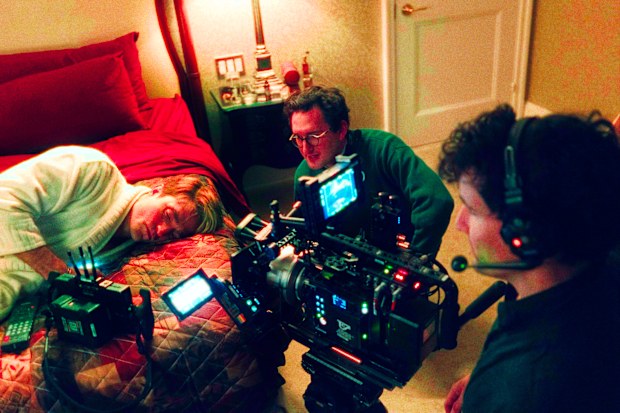 Robert Pattinson, from left, director Lance Oppenheim, and cinematographer David Bolen during the filming of “Primetime.”