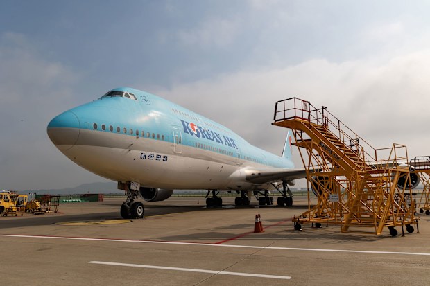 A Korean Air plane sits on the tarmac at Incheon International Airport.