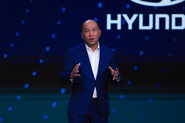 Optus funding cuts revealed as Singtel boss plans Australian visit