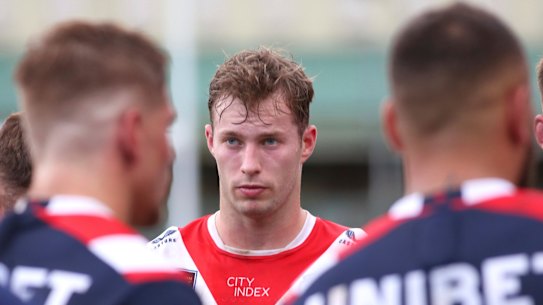 Sam Walker gets acquainted with his new teammates after being dropped to reserve grade last season.