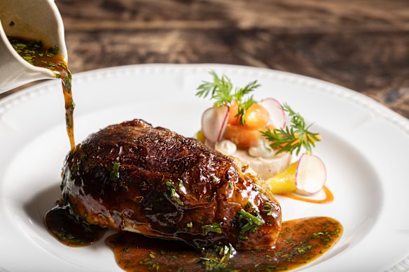 Rotisserie chicken breast with brioche and truffle stuffing.