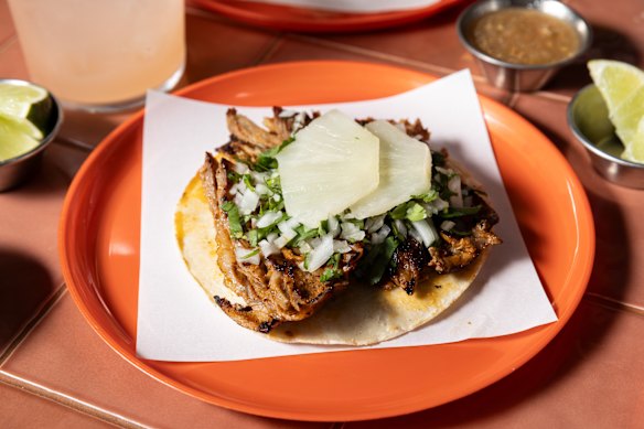 Taco al pastor with pork and pineapple.