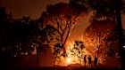 Flames engulf trees at La Adrada, in Spain’s Avila province at the weekend.