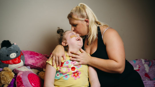Ebony Williams, pictured with mother Bobby at their home in Goulburn, has waited more than 700 days for surgery.