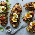 Ratatouille on toast with soft-boiled eggs.