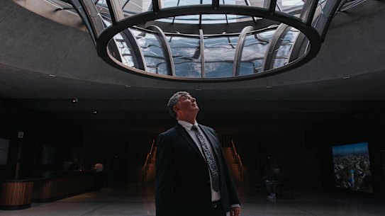 Wayne Hitches, executive program director at the Australian War Memorial, admires the oculus at the new entrance to the memorial.