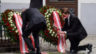 President Alexander Van der Bellen and Chancellor Sebastian Kurz lay a wreath in Vienna the day after a deadly shooting spree.