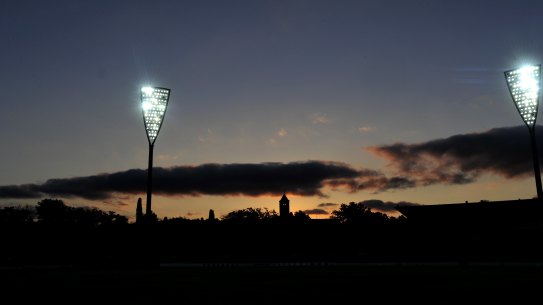 Manuka Oval's lights being turned on for the first time.