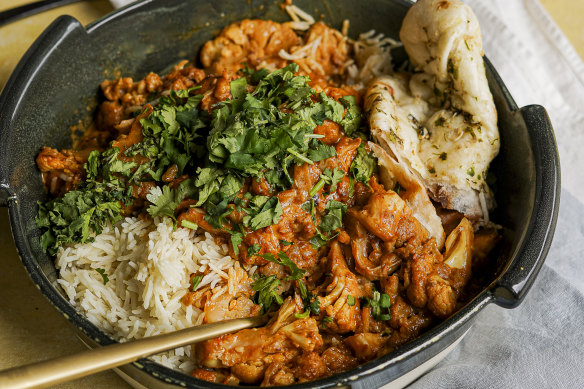 Cheat’s korma curry with cauliflower and halloumi.