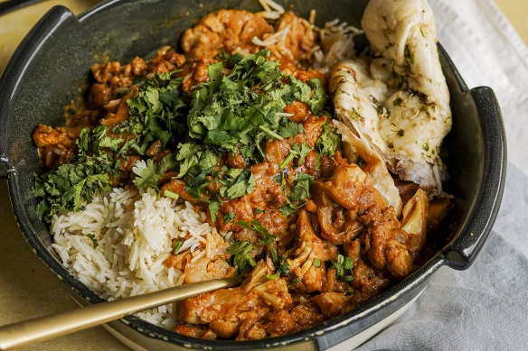 Cheat’s korma curry with cauliflower and halloumi cheese.