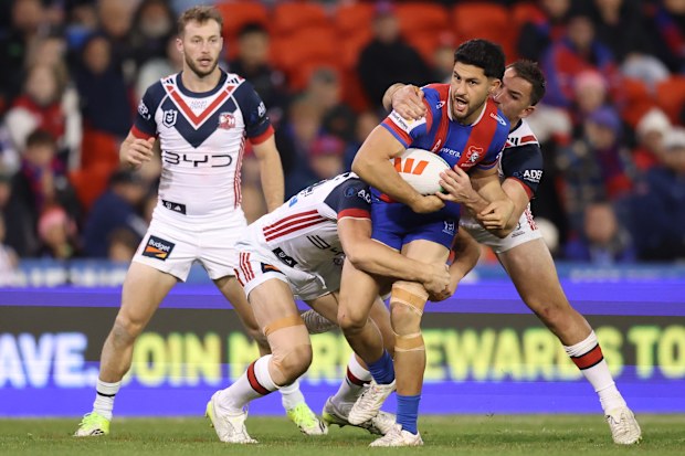 Dylan Brown of the Knights makes a hit up during the round 21 NRL match between Newcastle Knights and Sydney Roosters at McDonald Jones Stadium, on July 24, 2026, in Newcastle, Australia.