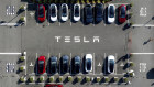 Tesla vehicles line a parking lot at the company’s Fremont, California, factory...