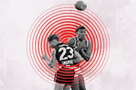 Collingwood’s Bobby Hill bumps the Brisbane Lions’ Keidean Coleman during the 2023 grand final.