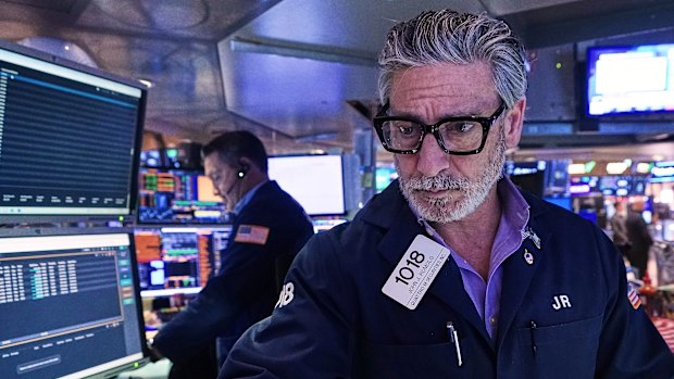 ASX slides lower after Wall Street drifts ahead of data dump