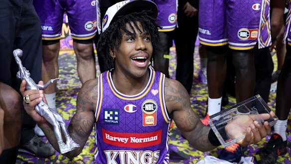 Kendric Davis celebrates the Sydney Kings’ victory.