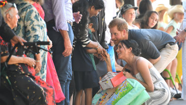 Prince Harry and his wife Meghan during a meet the people walk at Kingfisher Bay Resort on Fraser Island,