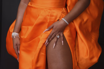 Megan Thee Stallion arrives at the 63rd annual Grammy Awards at the Los Angeles Convention Center on Sunday, March 14, 2021. 