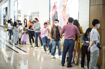 Shoppers line up at Chadstone on Friday afternoon.