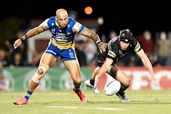 Blake Ferguson and Matt Burton battle for the ball.