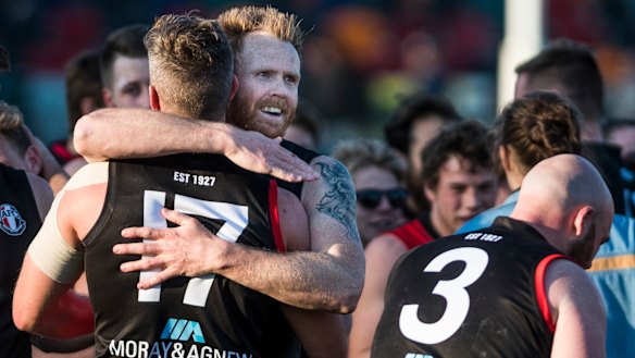 Ainslie celebrate a three-peat.