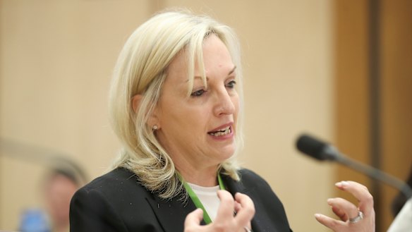 Christine Holgate defended the decision to buy four Cartier watches for employees as a reward for brokering a deal with Australian banks.