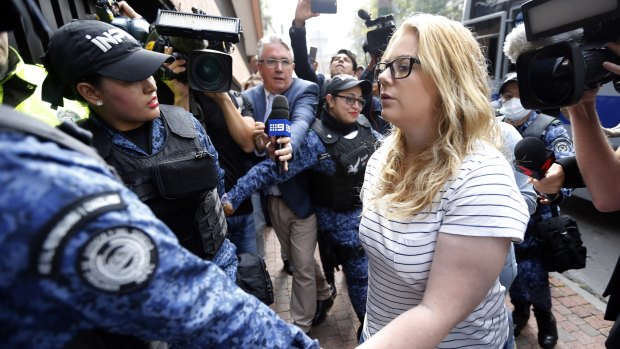 Cassandra Sainsbury is escorted to court in Bogota, Colombia, in 2017.