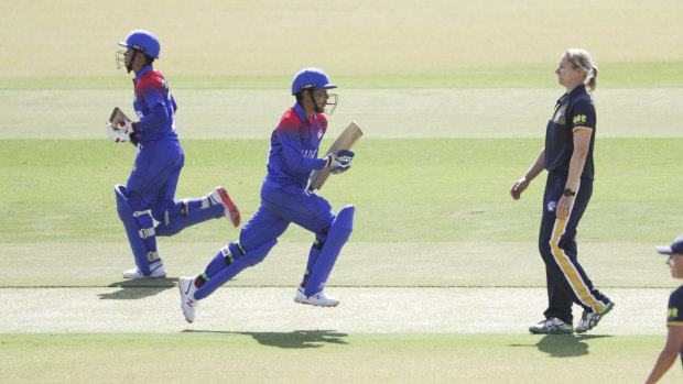 Nattakan Chantham, left, grew up playing cricket with a plastic ball.