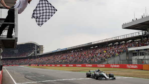 Lewis Hamilton crosses the line for Mercedes to win the German Formula One Grand Prix at Hockenheim on Sunday.