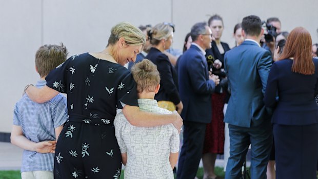 Lucy Quarterman, and her children Luca and Ben, watched Richard Di Natale resign as Greens leader on Monday. 