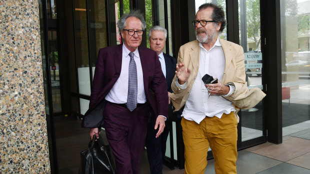 Geoffrey Rush, with theatre director Neil Armfield outside court on Wednesday. 