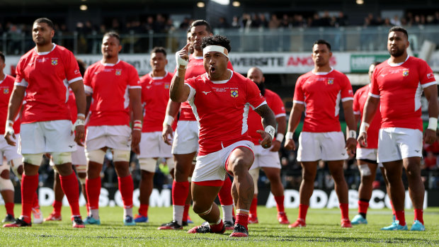 Issuing the challenge: Siale Piutau of Tonga leads the Sipi Tau ahead of the Test match against the All Blacks in Hamilton.